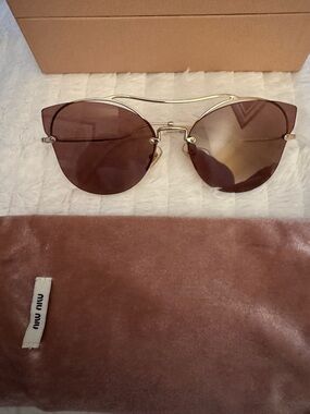 Miu Miu Gold Metal Frame Sunglasses with rose colored Lenses